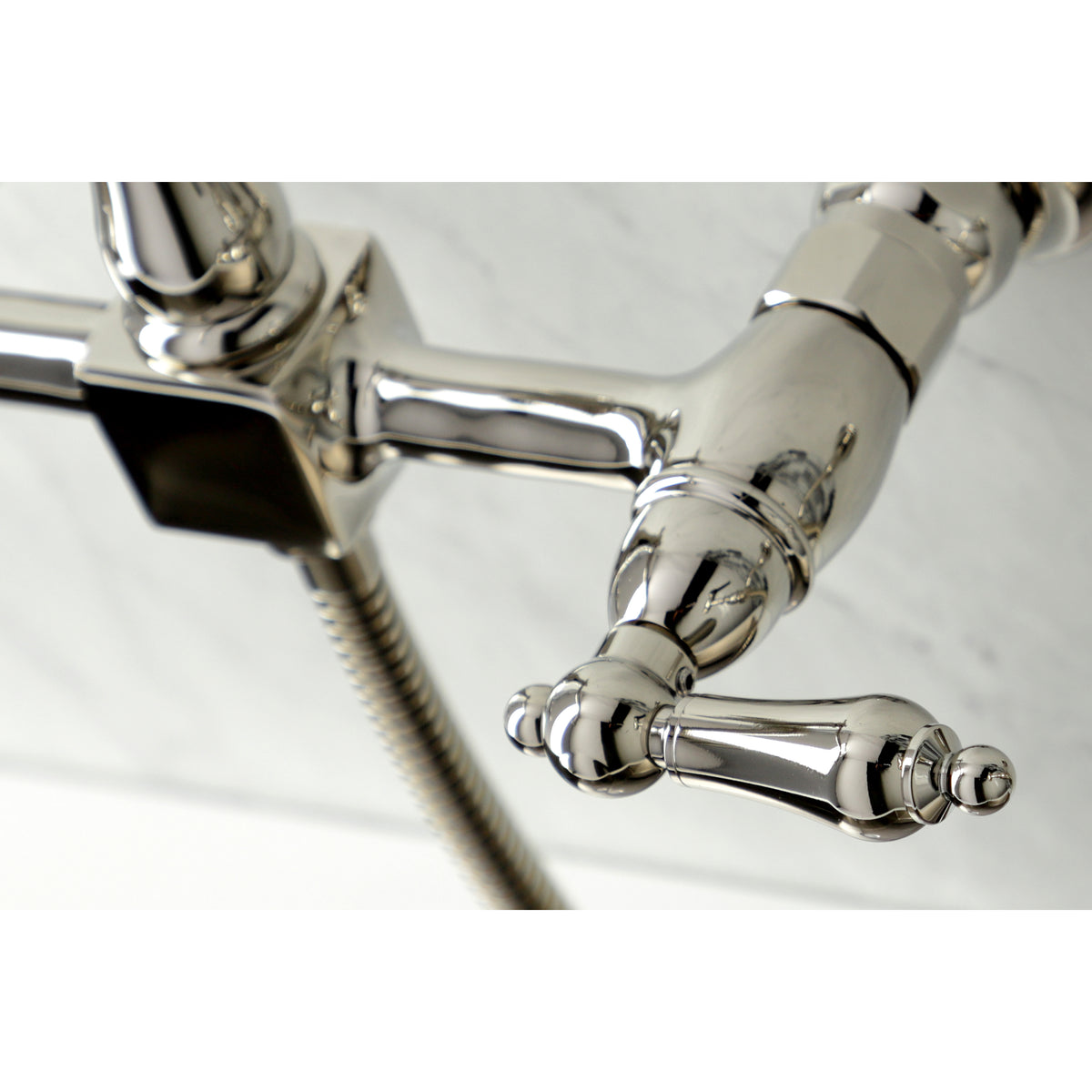 Kingston Brass KS1246ALBS Heritage Wall Mount Bridge Kitchen Faucet with Brass Spray