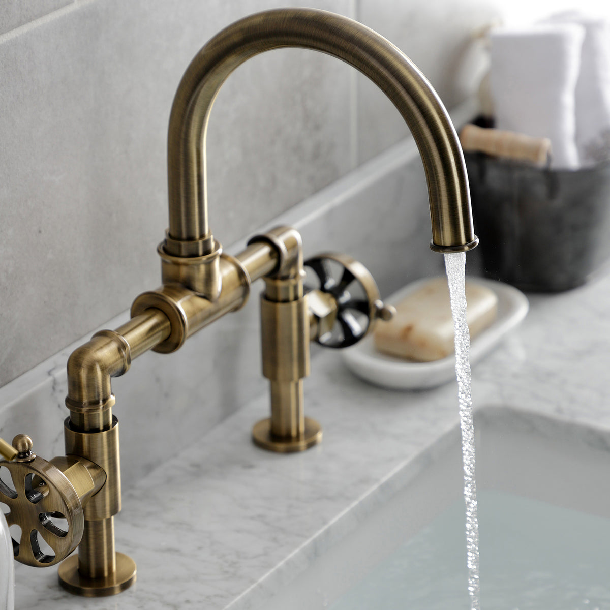 Kingston Brass KS217RXVN Belknap Industrial Style Wheel Handle Bridge Bathroom Faucet with Pop-Up Drain