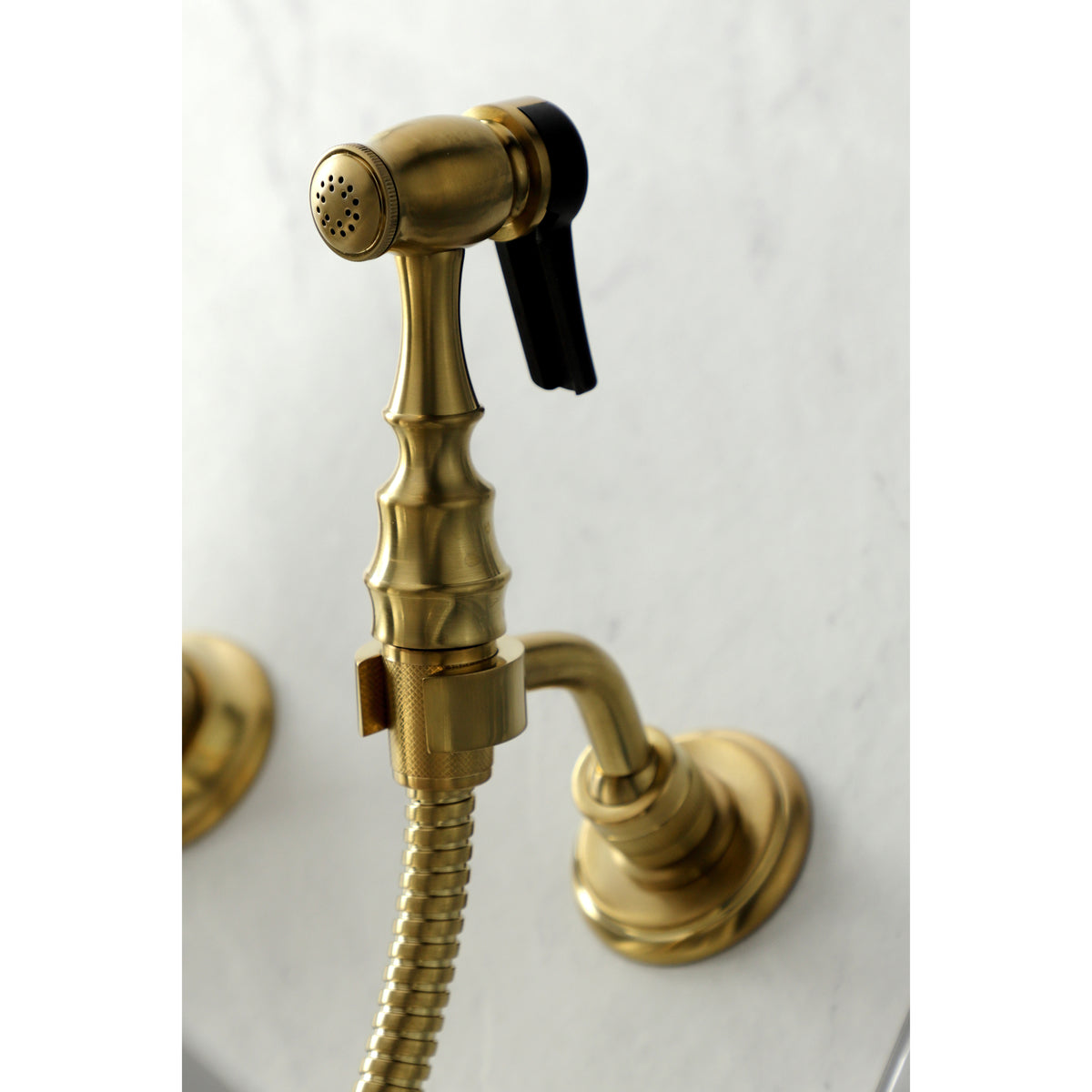 Kingston Brass KS1262PKLBS Duchess Wall Mount Bridge Kitchen Faucet with Brass Sprayer