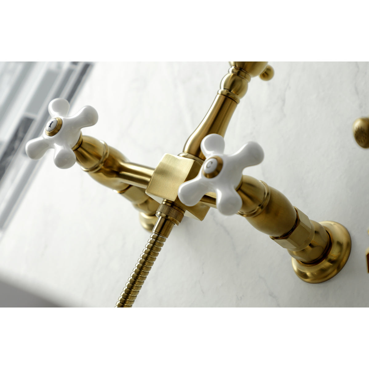 Kingston Brass KS1261PXBS Heritage Wall Mount Bridge Kitchen Faucet with Brass Sprayer