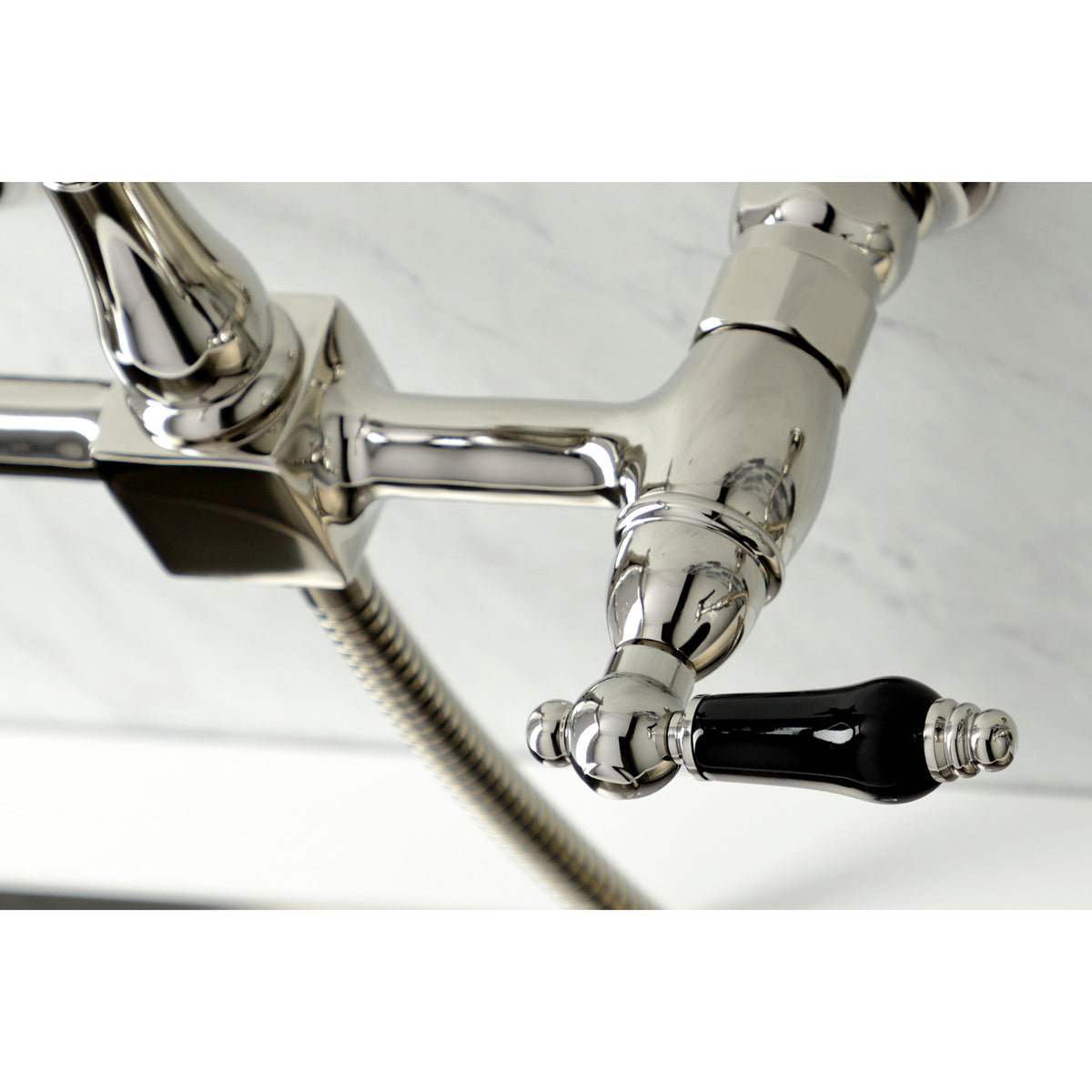 Kingston Brass KS1262PKLBS Duchess Wall Mount Bridge Kitchen Faucet with Brass Sprayer