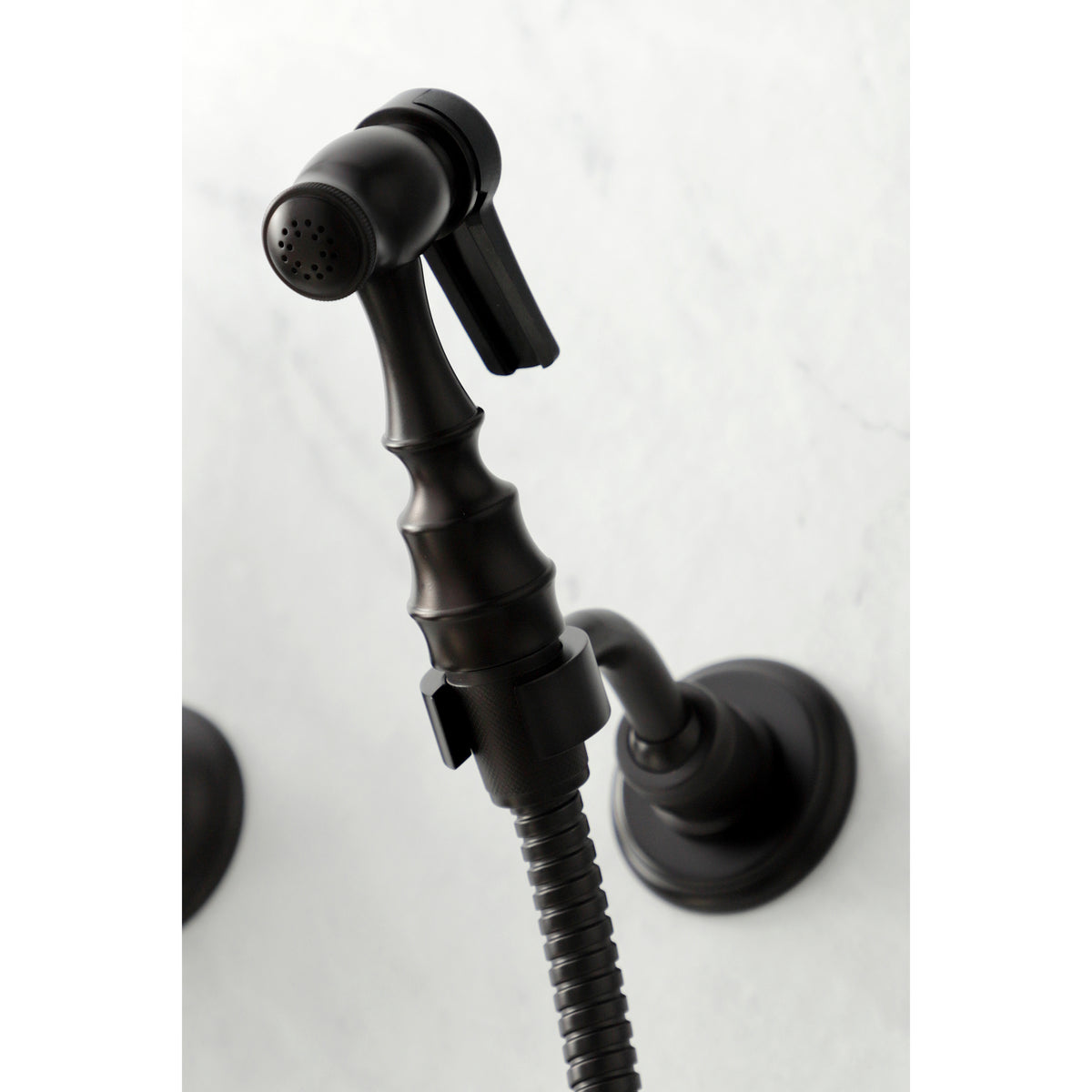 Kingston Brass KS1262PKLBS Duchess Wall Mount Bridge Kitchen Faucet with Brass Sprayer