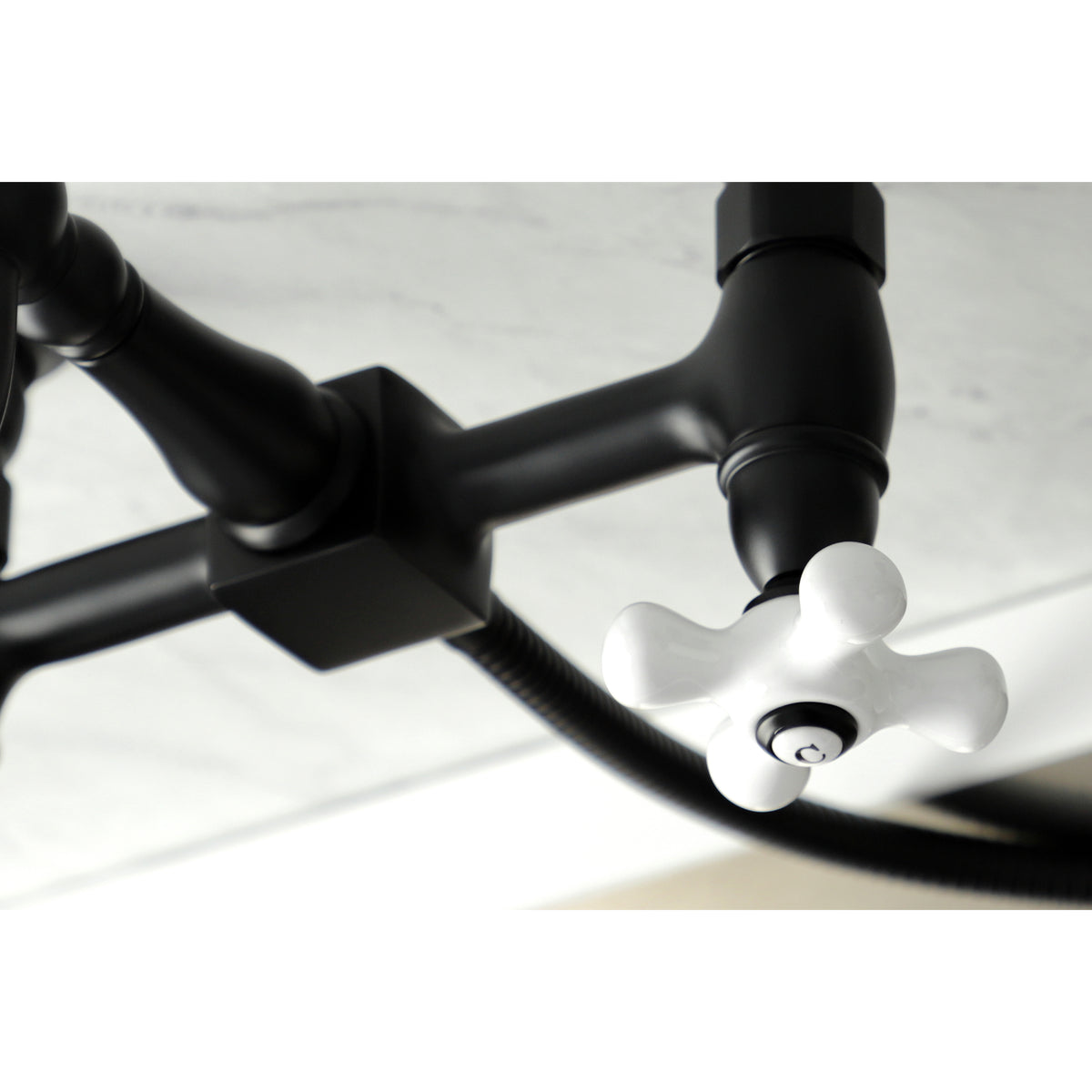 Kingston Brass KS1261PXBS Heritage Wall Mount Bridge Kitchen Faucet with Brass Sprayer