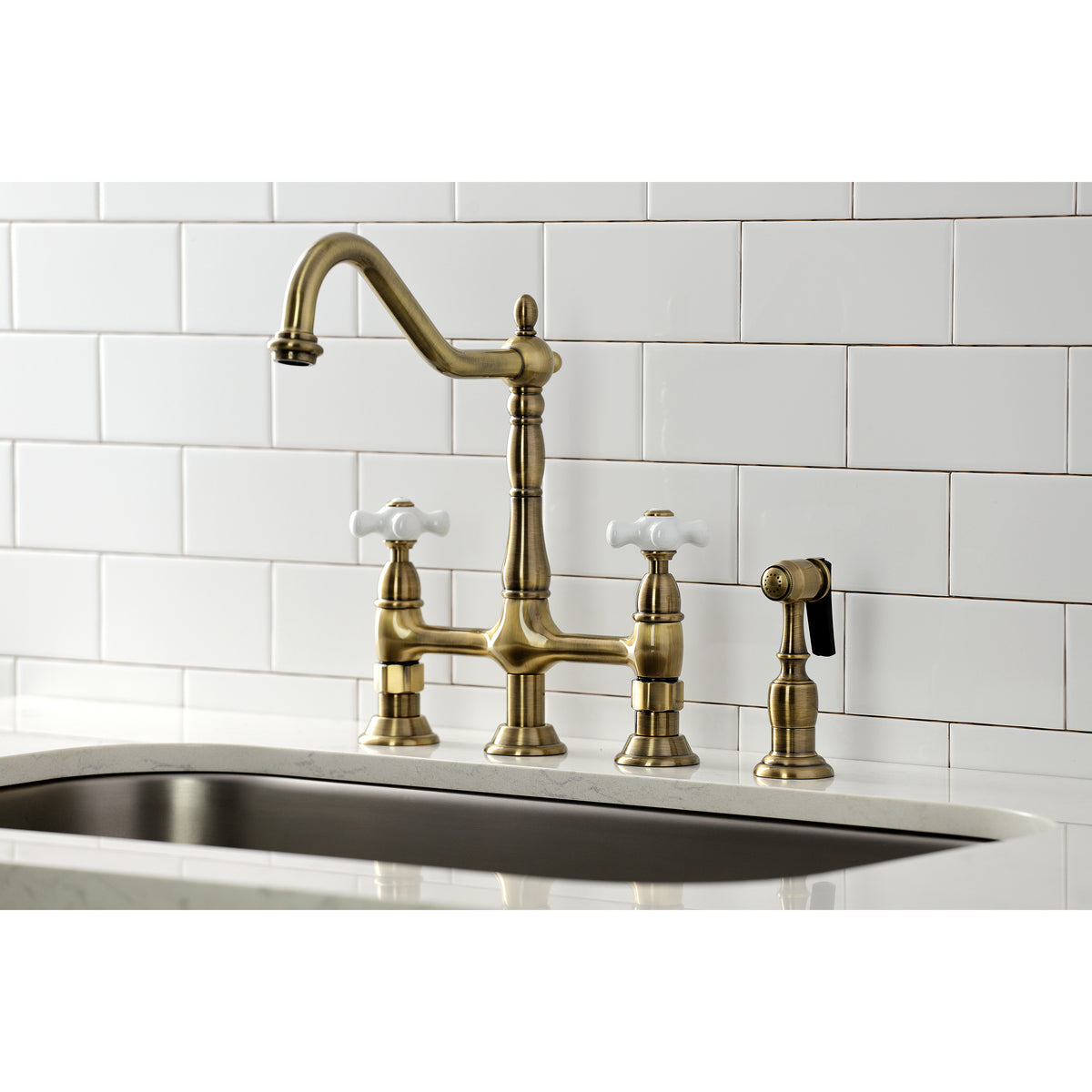 Kingston Brass KS1273PXBS Heritage Bridge Kitchen Faucet with Brass Sprayer