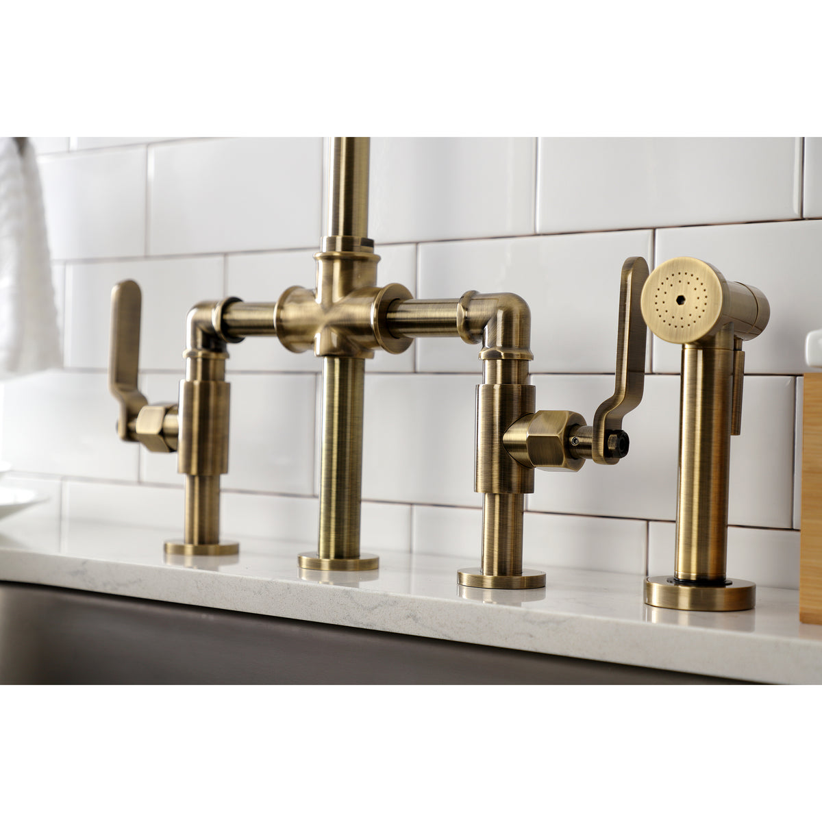 Kingston Brass KS2330KL Whitaker Industrial Style Bridge Kitchen Faucet with Brass Sprayer