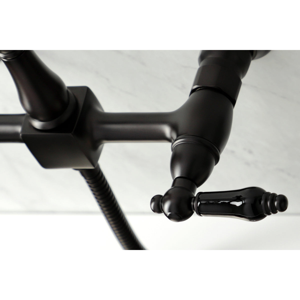 Kingston Brass KS1262PKLBS Duchess Wall Mount Bridge Kitchen Faucet with Brass Sprayer