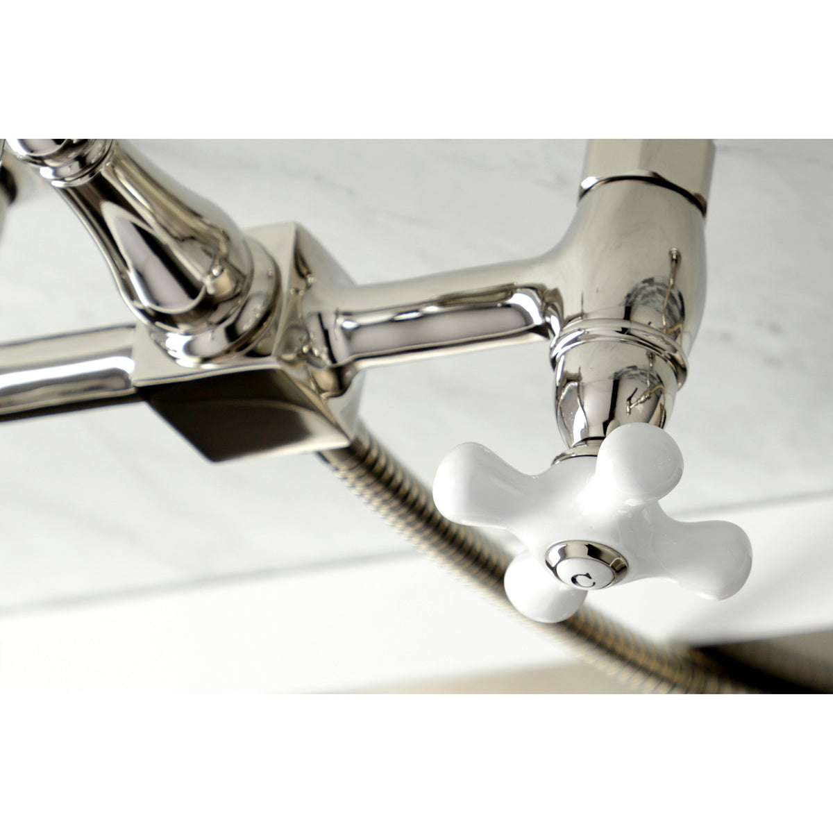 Kingston Brass KS1261PXBS Heritage Wall Mount Bridge Kitchen Faucet with Brass Sprayer