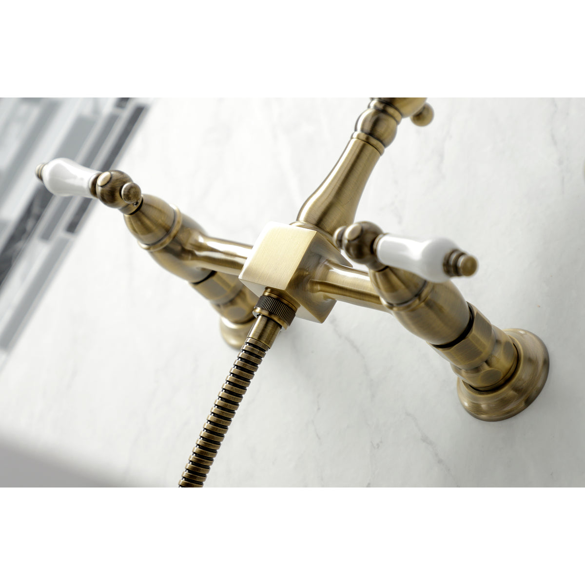 Kingston Brass KS1243PLBS Heritage Wall Mount Bridge Kitchen Faucet with Brass Spray