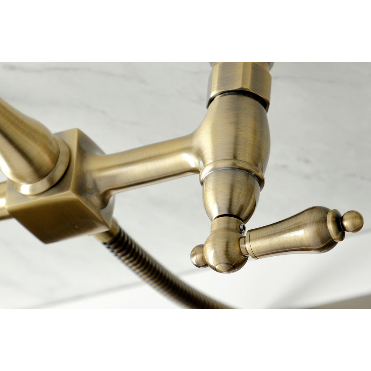Kingston Brass KS1246ALBS Heritage Wall Mount Bridge Kitchen Faucet with Brass Spray