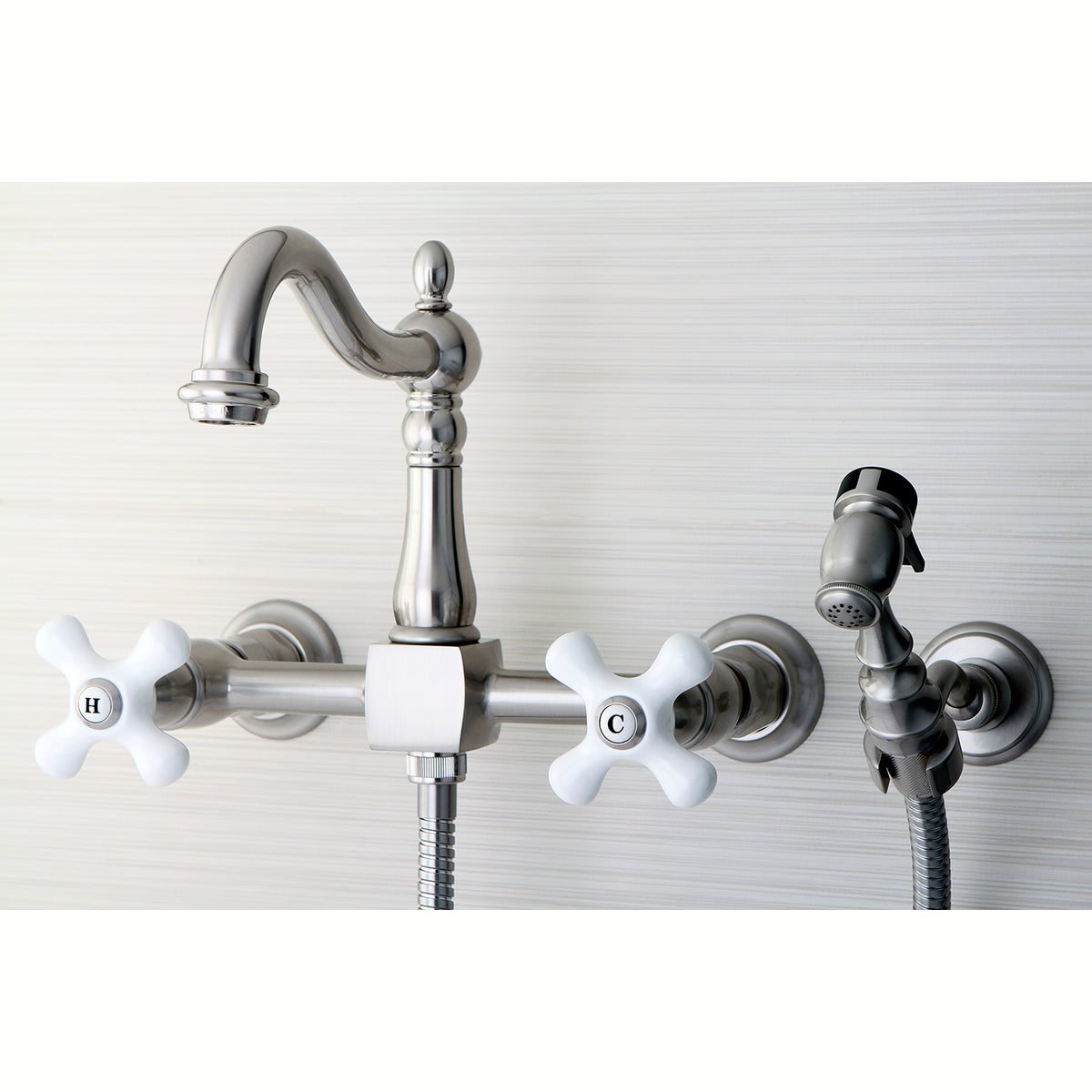 Kingston Brass KS1261PXBS Heritage Wall Mount Bridge Kitchen Faucet with Brass Sprayer