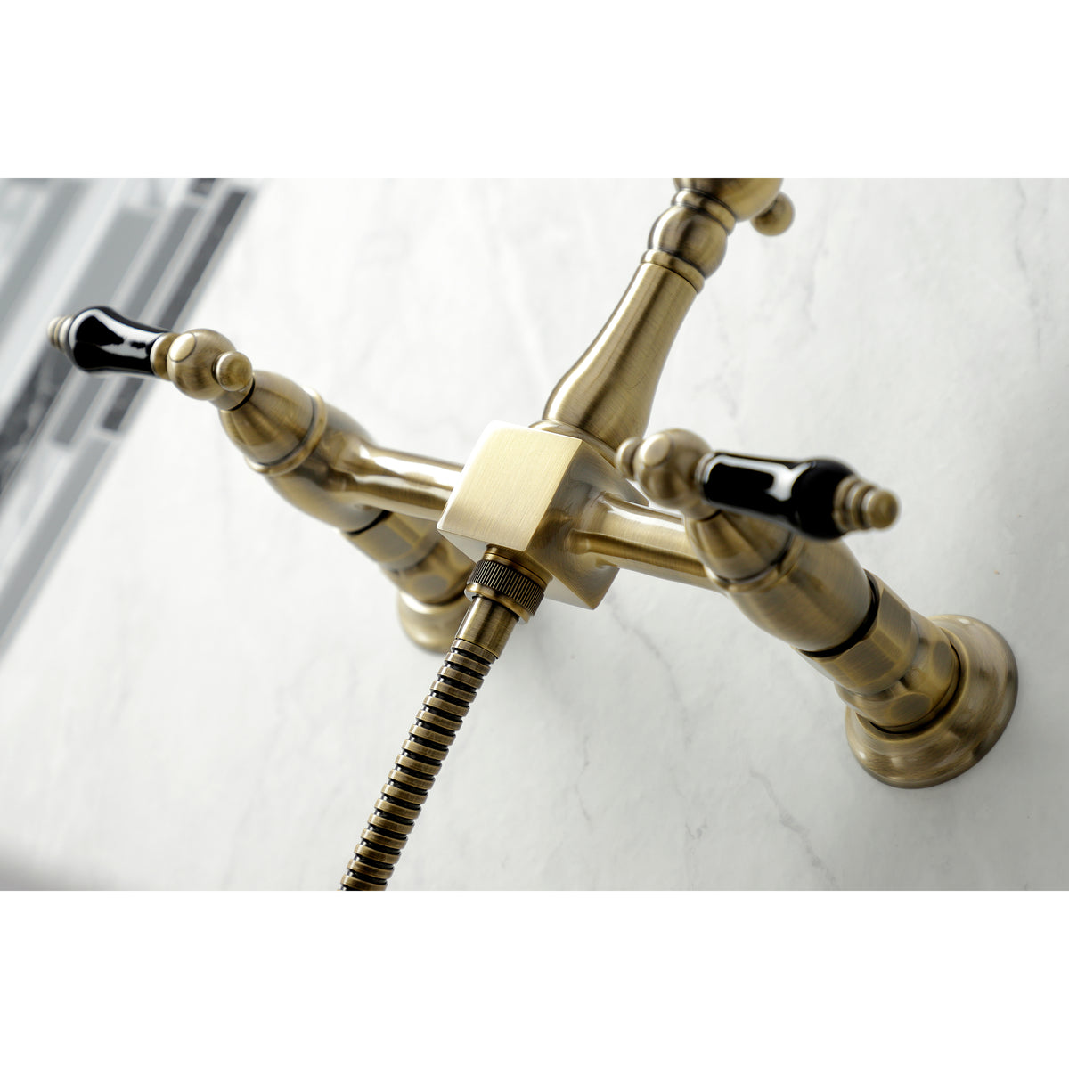 Kingston Brass KS1262PKLBS Duchess Wall Mount Bridge Kitchen Faucet with Brass Sprayer
