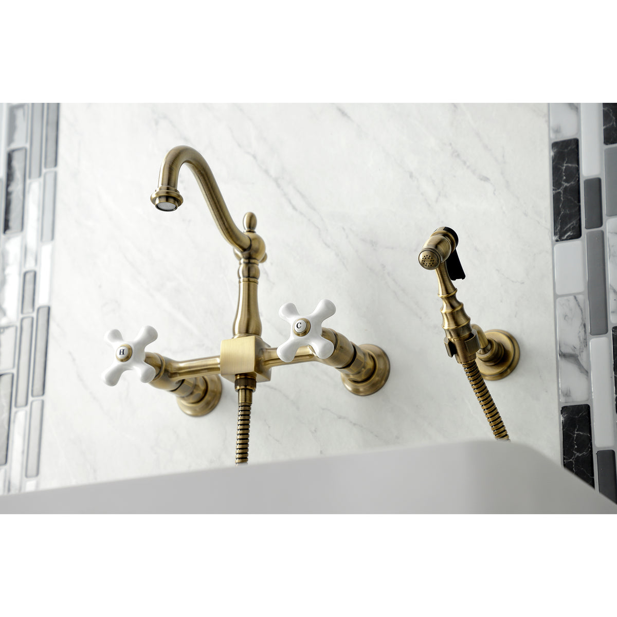 Kingston Brass KS1261PXBS Heritage Wall Mount Bridge Kitchen Faucet with Brass Sprayer