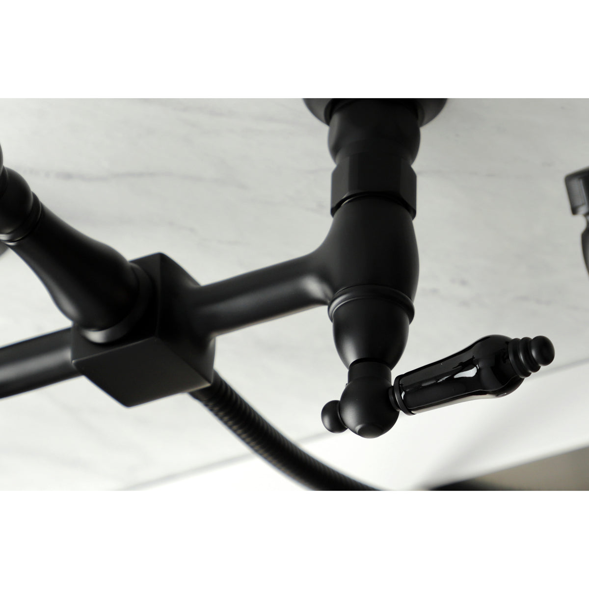 Kingston Brass KS1262PKLBS Duchess Wall Mount Bridge Kitchen Faucet with Brass Sprayer