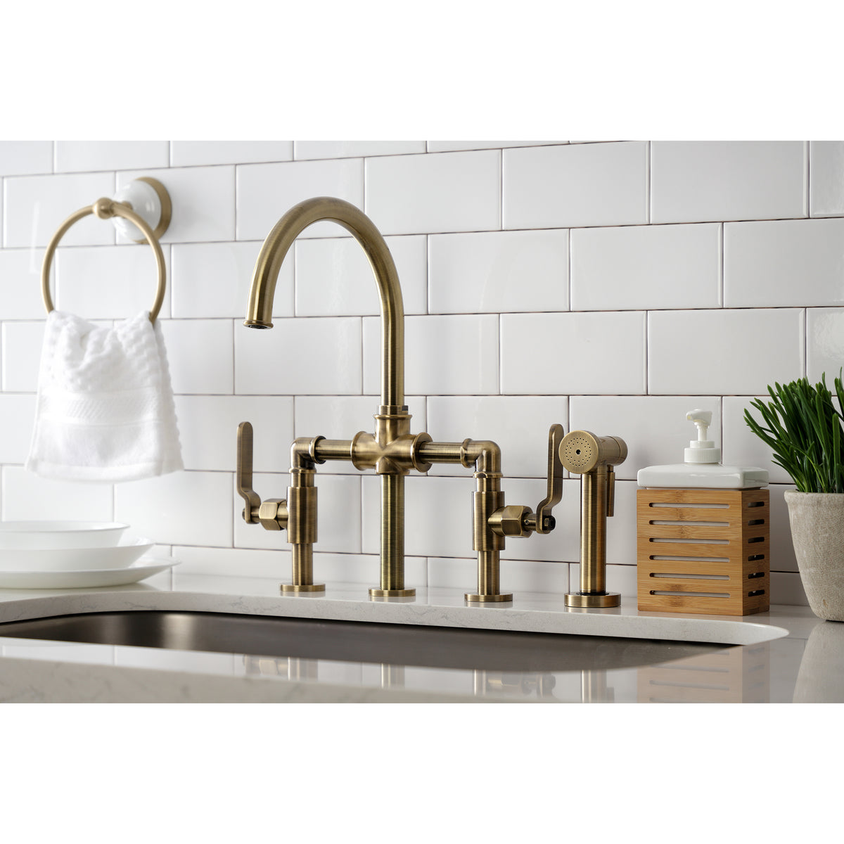Kingston Brass KS2330KL Whitaker Industrial Style Bridge Kitchen Faucet with Brass Sprayer